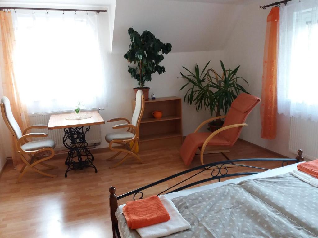 Łóżko lub łóżka w pokoju w obiekcie Apartmány F-M