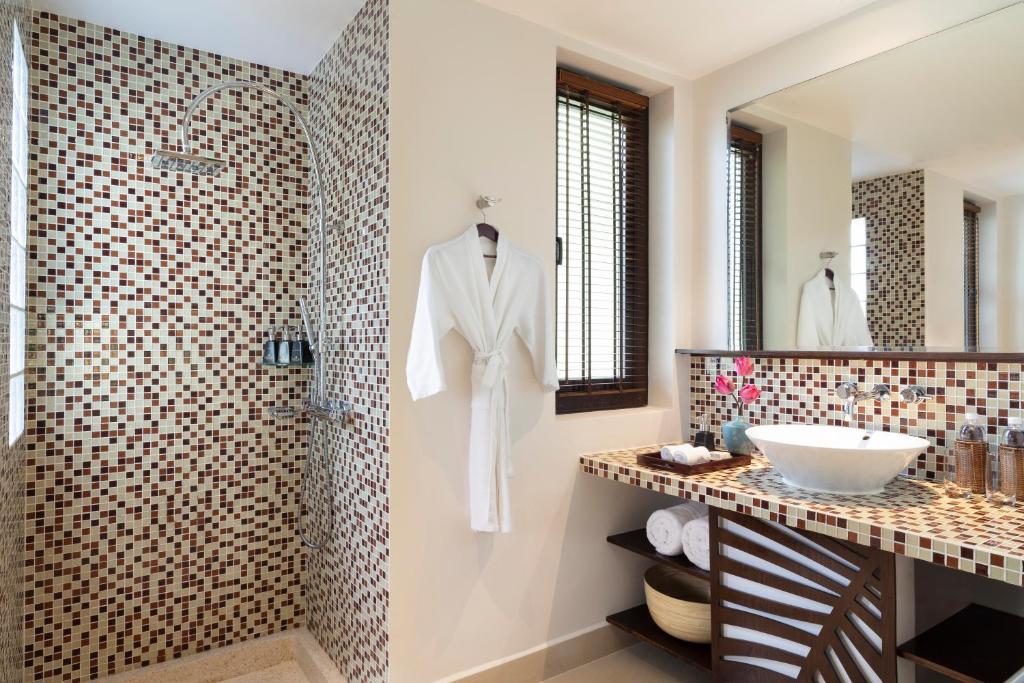 Koupelna v ubytování Anantara Hoi An Resort