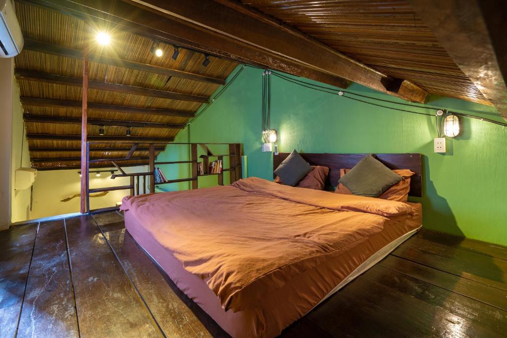Postel nebo postele na pokoji v ubytování Little Nap Homestay