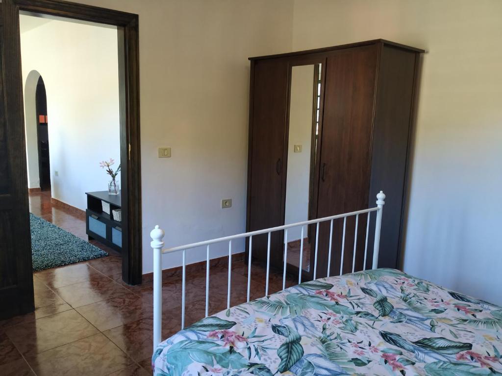 A bed or beds in a room at Casa Vista Bella