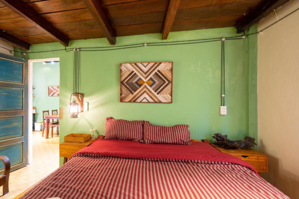 Postel nebo postele na pokoji v ubytování Little Nap Homestay