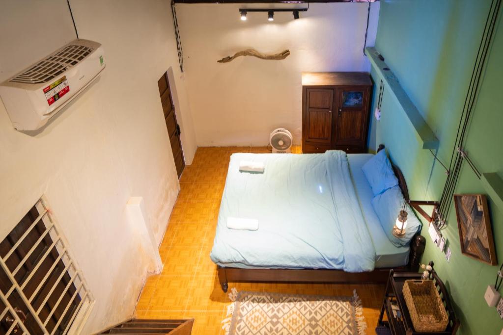 Postel nebo postele na pokoji v ubytování Little Nap Homestay