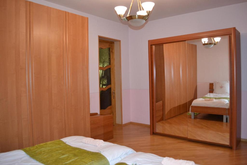 Postel nebo postele na pokoji v ubytování Royal Telavi