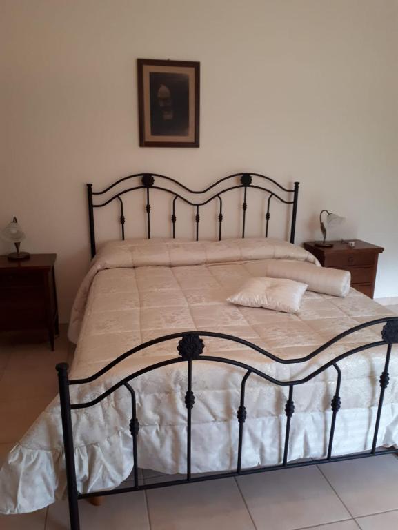 Postel nebo postele na pokoji v ubytování B&B Porta del Gargano