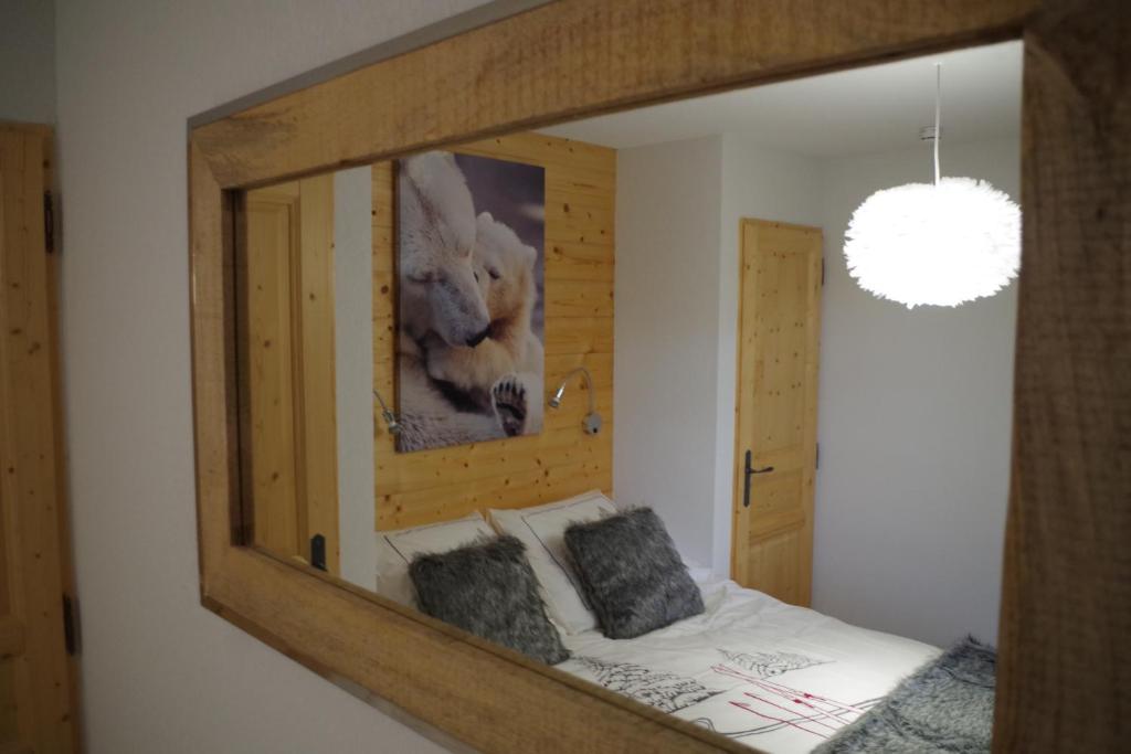 Postel nebo postele na pokoji v ubytování Résidence : Le Crystal Chalet