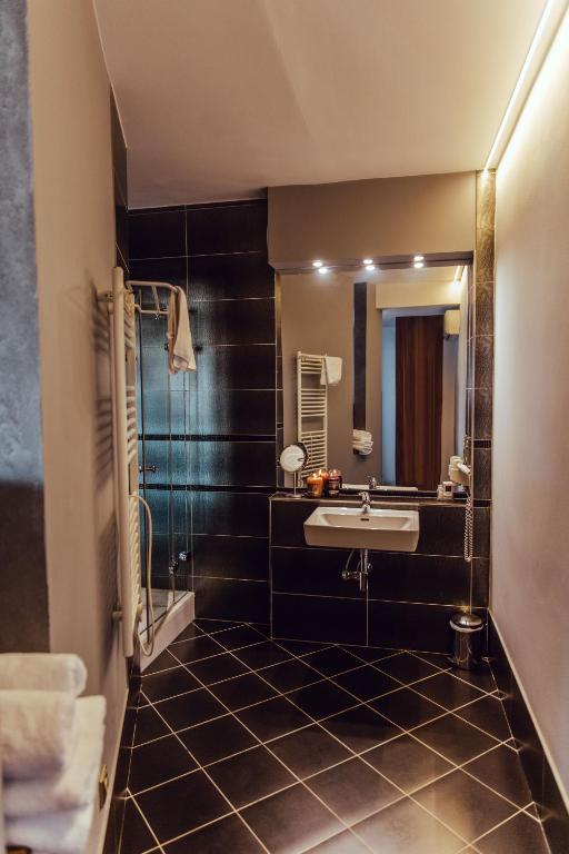 Koupelna v ubytování Hotel Garni Klaret