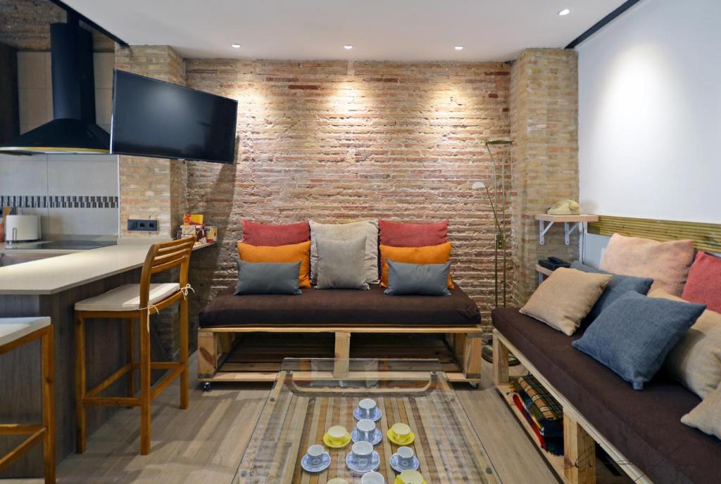 A seating area at Casita en el Cabañal con Patio