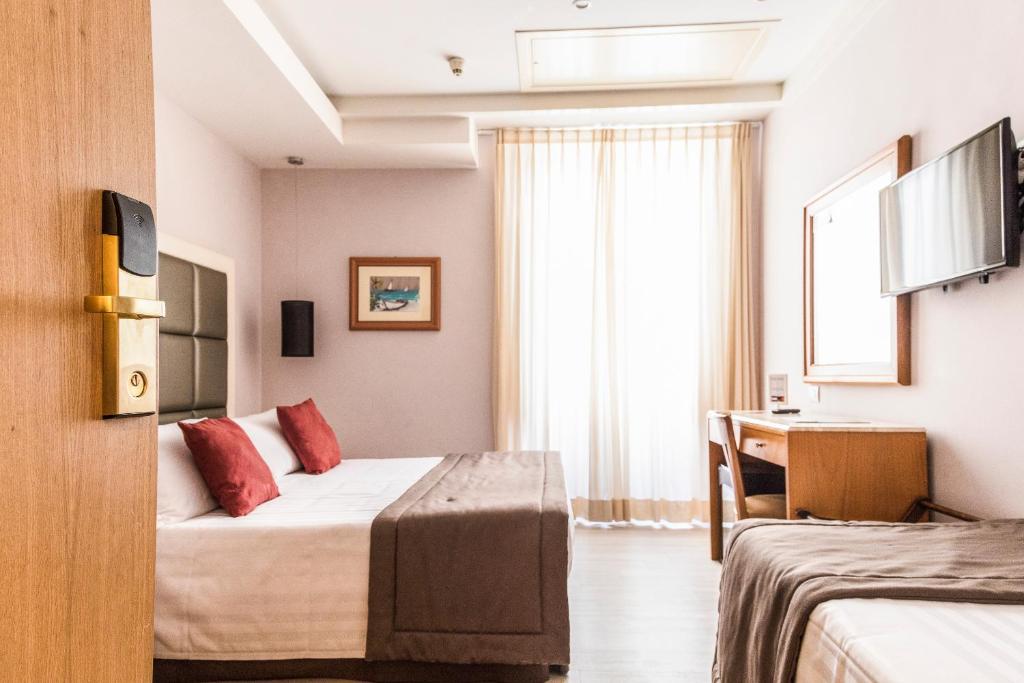 Posteľ alebo postele v izbe v ubytovaní Vibe Nazionale