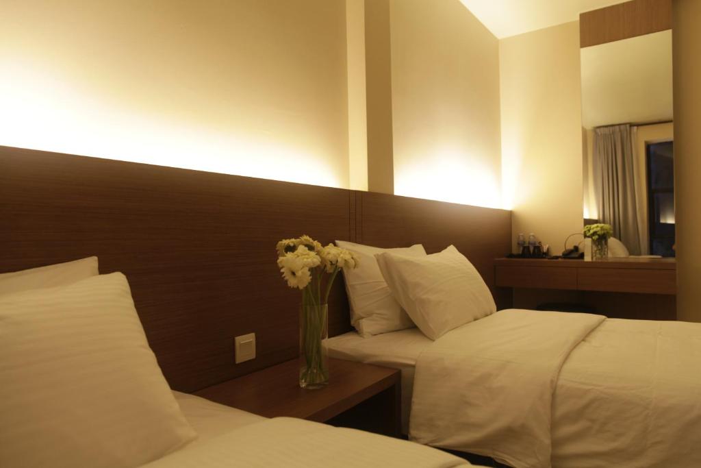 Postel nebo postele na pokoji v ubytování I am Jazz Hotel