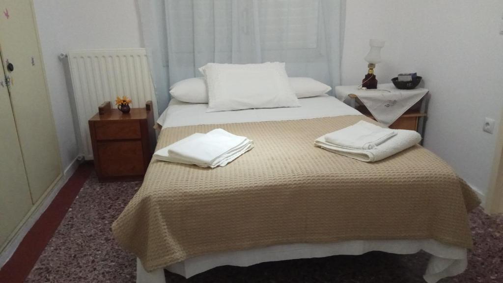 Postel nebo postele na pokoji v ubytování LENA'S SWEET HOME