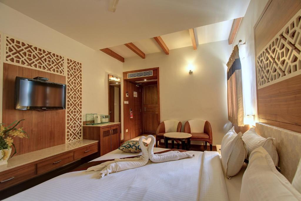 TV a/nebo společenská místnost v ubytování Hotel Prince Gardens