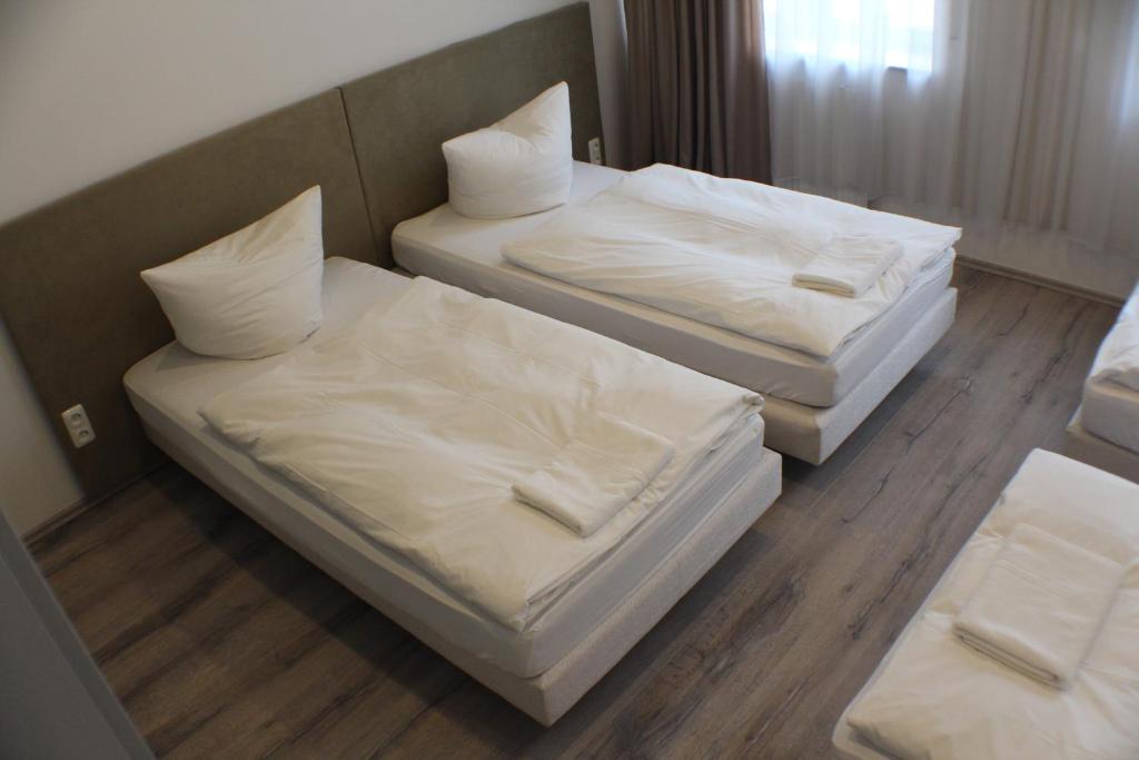 Postel nebo postele na pokoji v ubytování Slamba Hostel