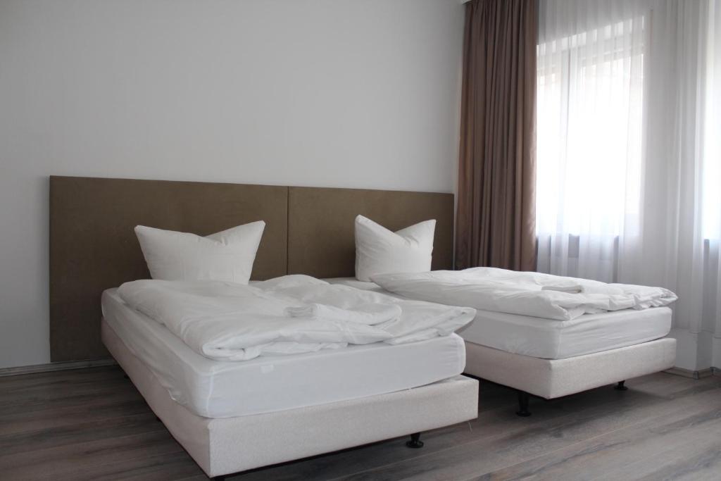 Postel nebo postele na pokoji v ubytování Slamba Hostel