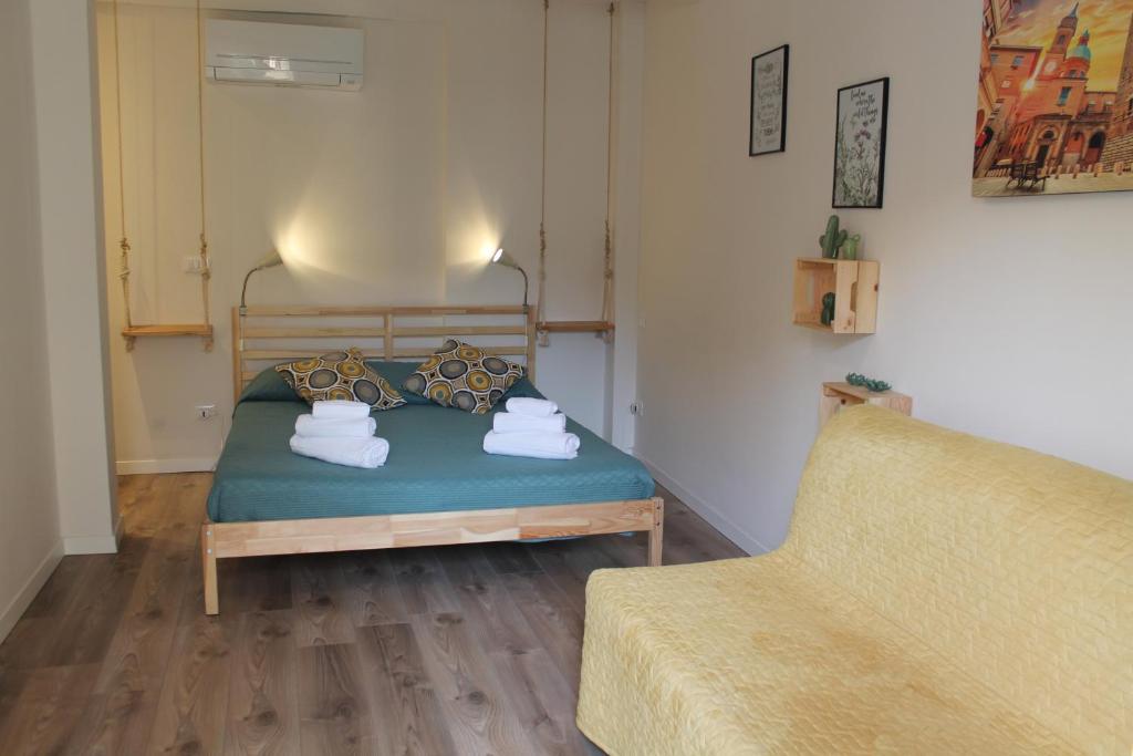 A bed or beds in a room at Dimora Orfeo