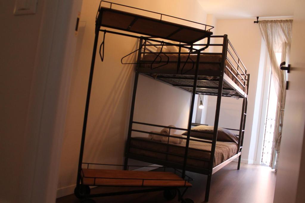 A bed or beds in a room at Dimora Orfeo