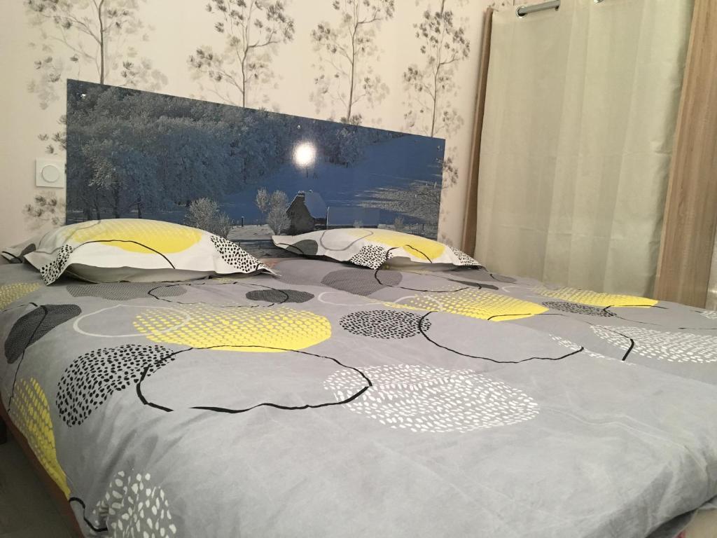 Postel nebo postele na pokoji v ubytování Gîte aux Portes d'Aubrac