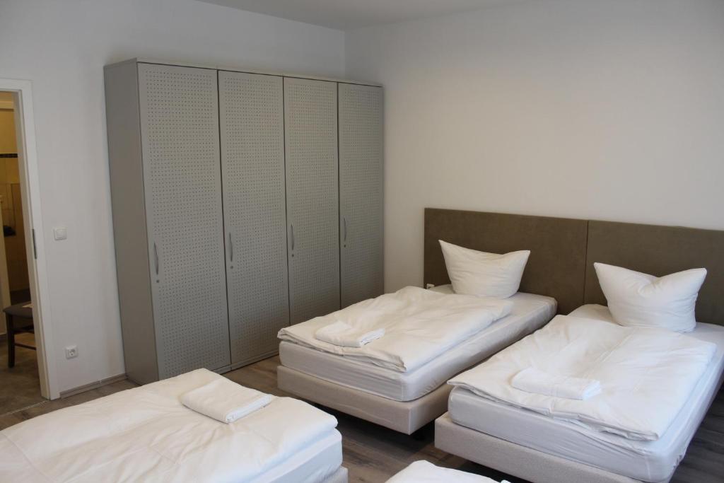 Postel nebo postele na pokoji v ubytování Slamba Hostel