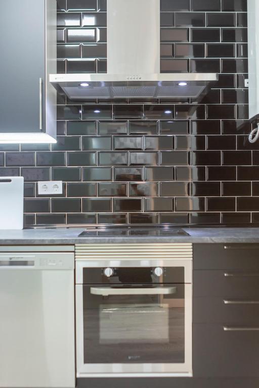 A kitchen or kitchenette at Plaza Mayor Apartment