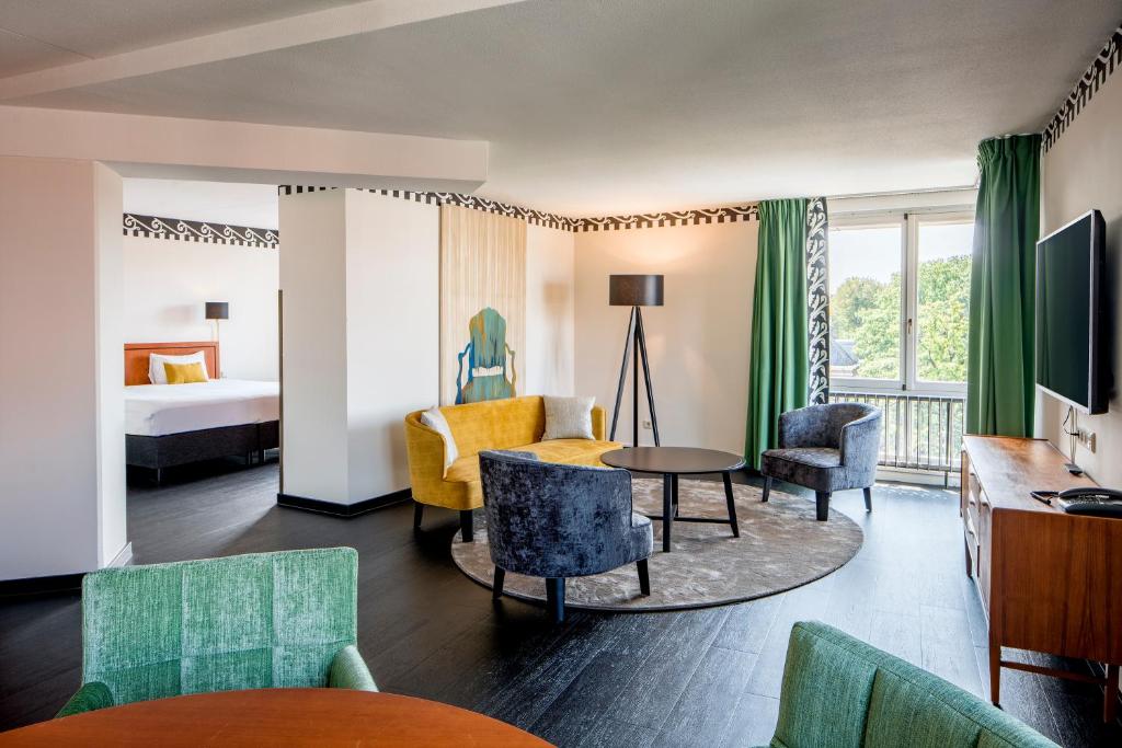 TV a/nebo společenská místnost v ubytování Hotel Theater Figi
