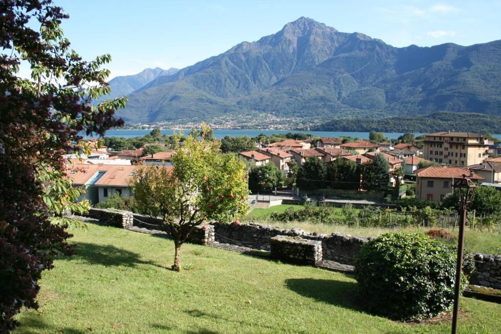 a view of a village with mountains in the background at Agriturismo Badalone in Domaso
