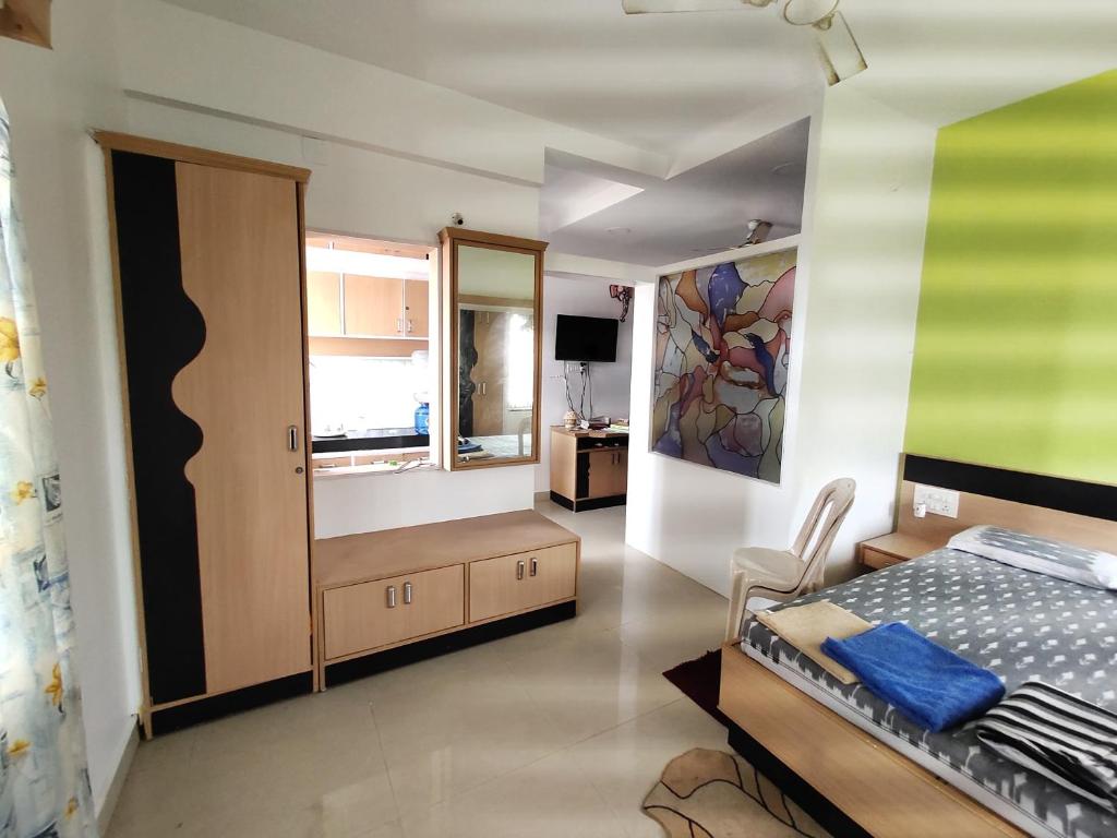 Postel nebo postele na pokoji v ubytování NIRMAN beach homestay
