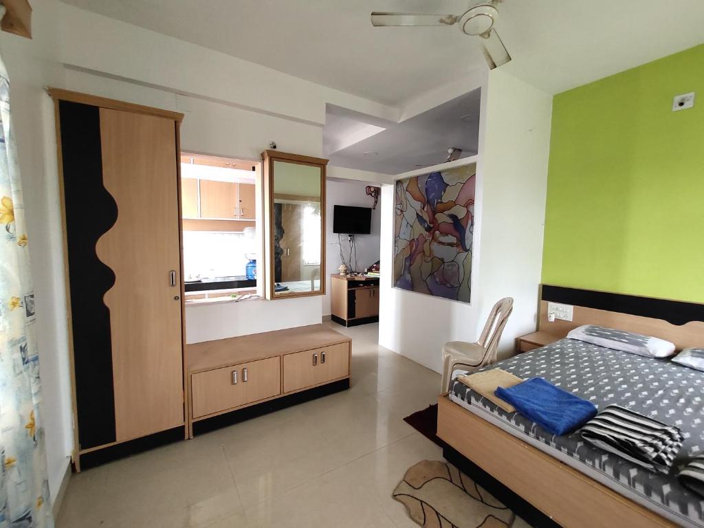 Postel nebo postele na pokoji v ubytování NIRMAN beach homestay