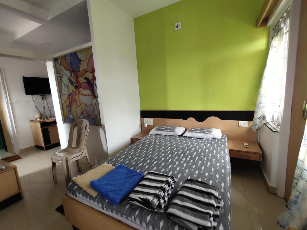 Postel nebo postele na pokoji v ubytování NIRMAN beach homestay