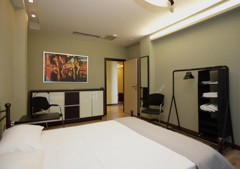 Postel nebo postele na pokoji v ubytování Chalkida Seafront Apartment