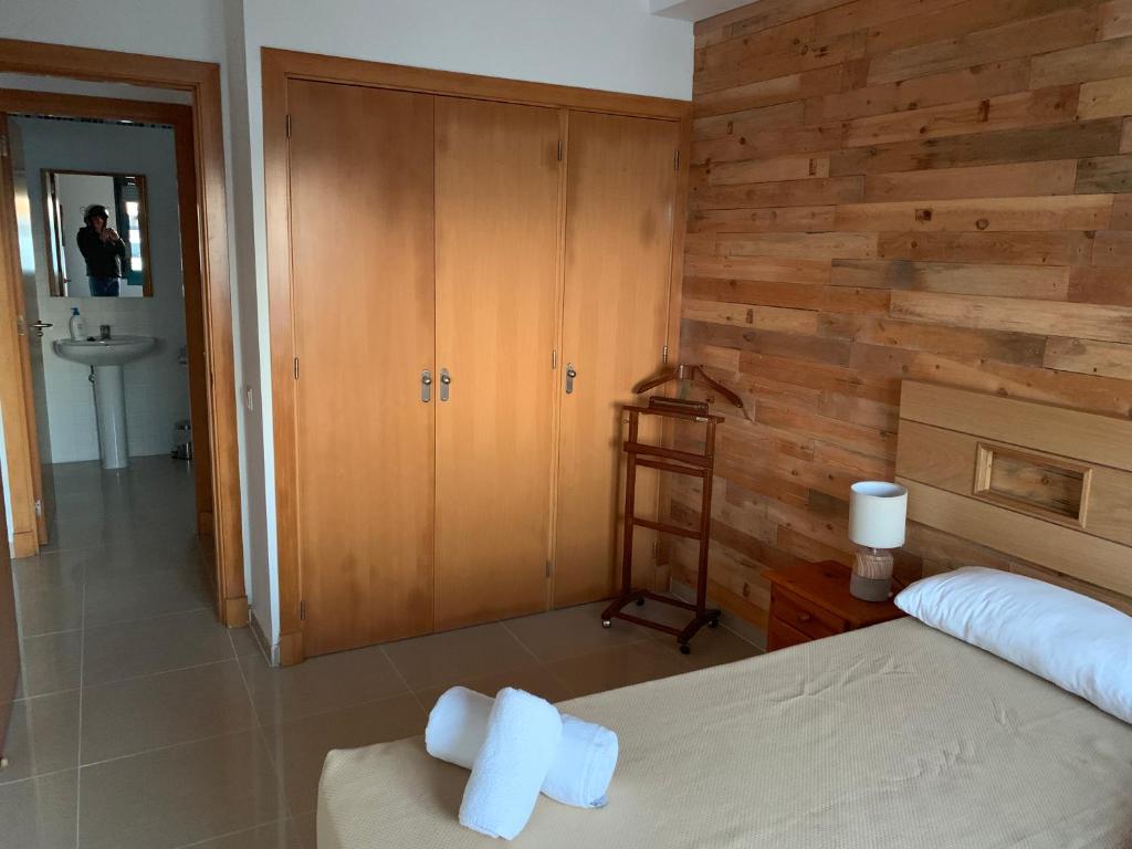 Postel nebo postele na pokoji v ubytování Apartamento Aqua Vitae