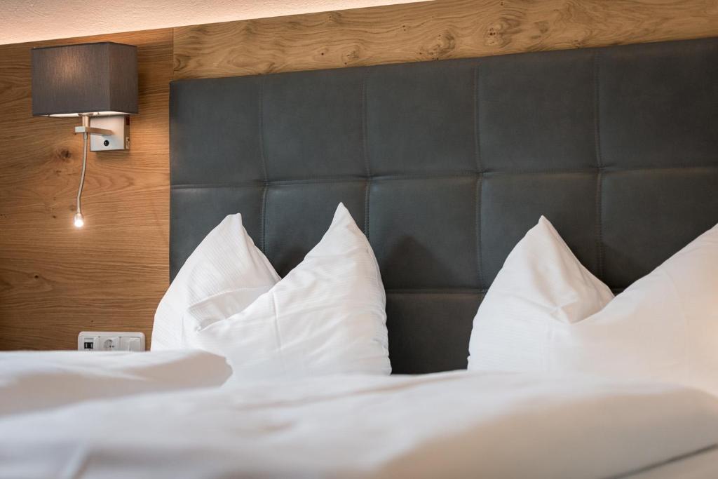 Postel nebo postele na pokoji v ubytování Hotel Plankenhof B&B