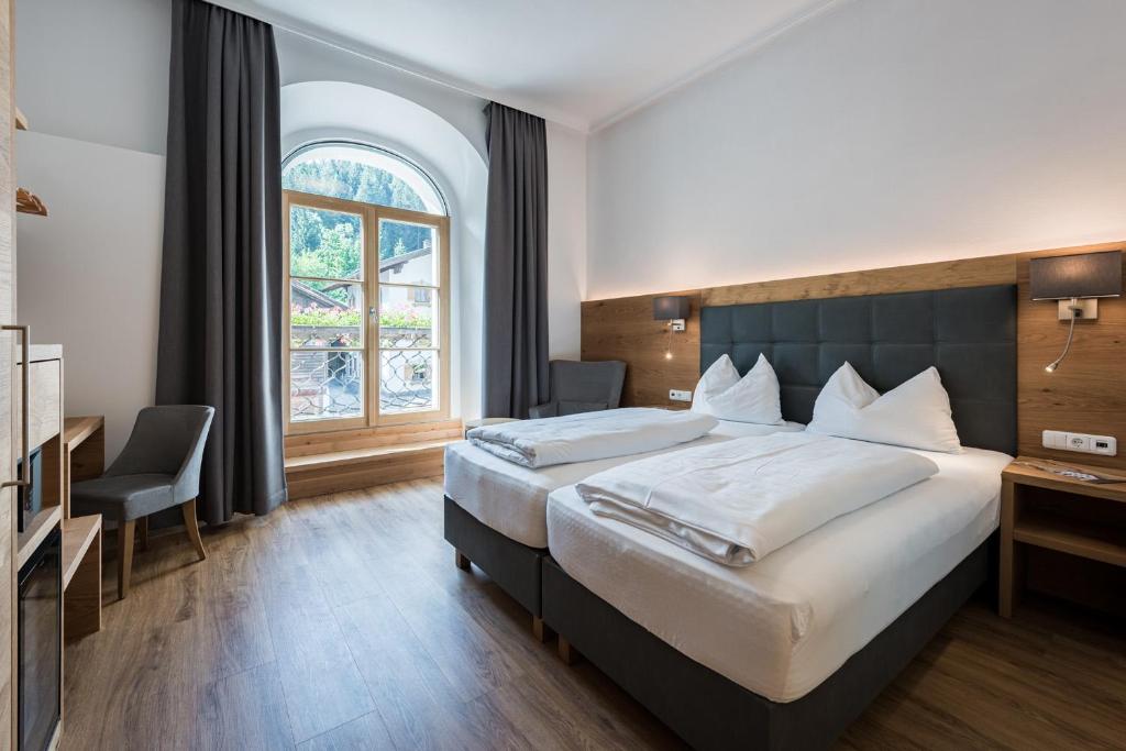 Postel nebo postele na pokoji v ubytování Hotel Plankenhof B&B