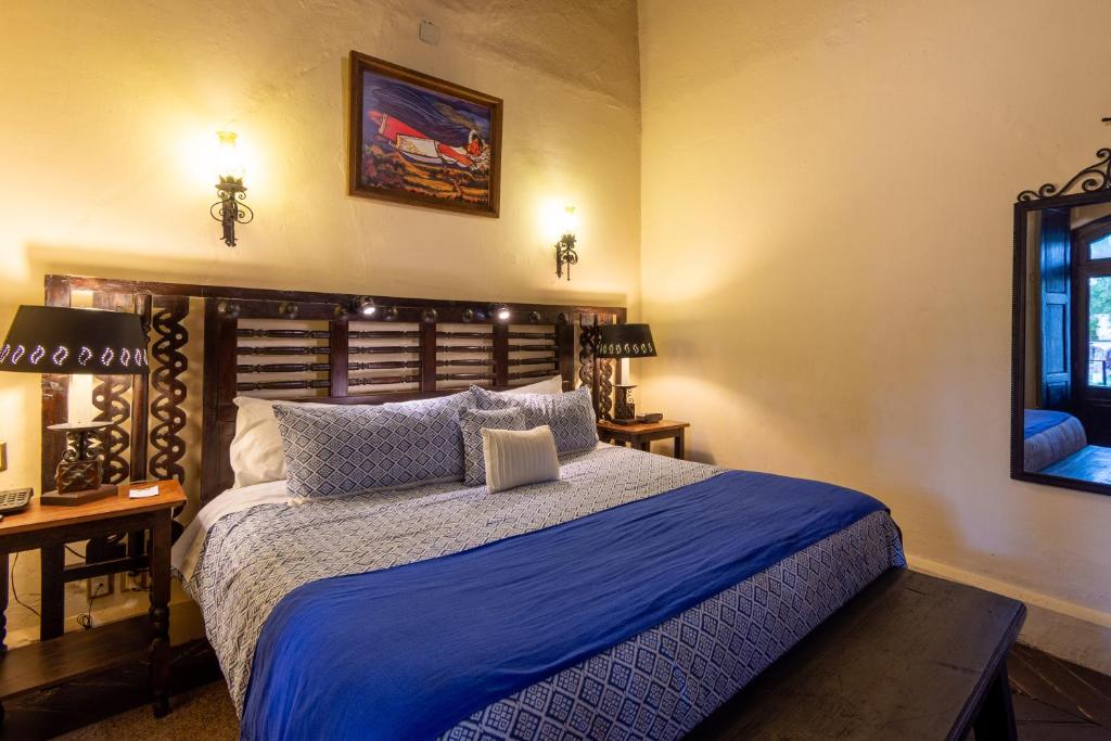 Postel nebo postele na pokoji v ubytování Hotel Mansion Iturbe