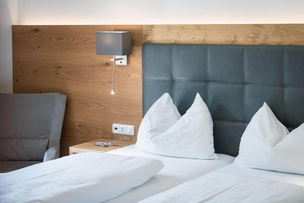 Postel nebo postele na pokoji v ubytování Hotel Plankenhof B&B