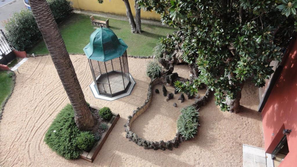 Jardín al aire libre en Aparthotel Can Gallart