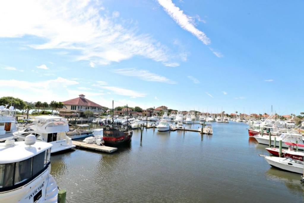 a bunch of boats docked in a harbor at Inn at Camachee Harbor View 22 in Saint Augustine