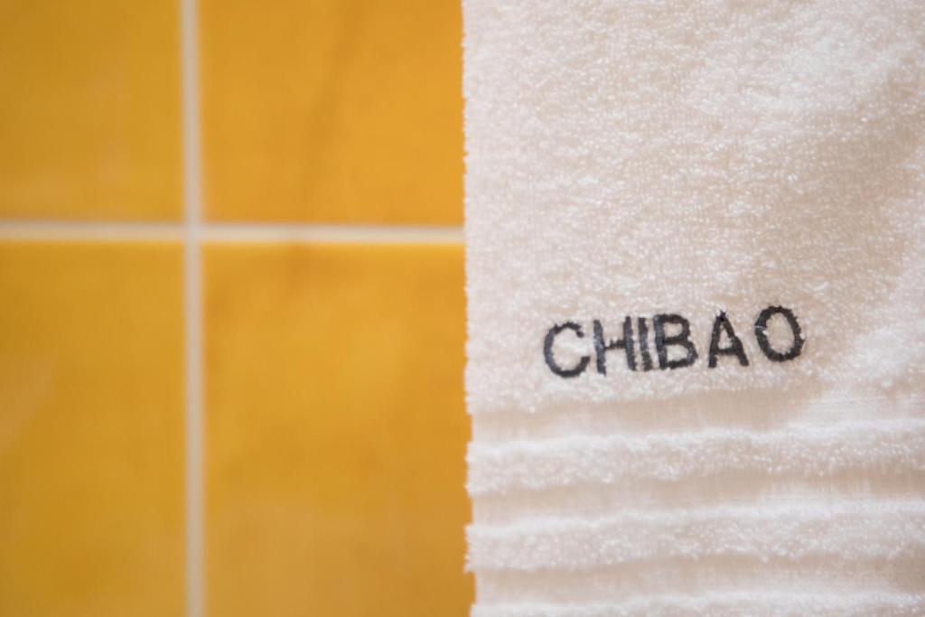 Certifikát, hodnocení, plakát nebo jiný dokument vystavený v ubytování Chibao