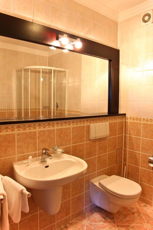 Kúpeľňa v ubytovaní Wzgórze Toskanii Conferences & Restaurant