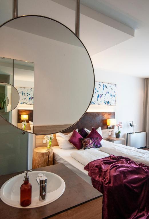 Postel nebo postele na pokoji v ubytování Business Class Hotel Ebersberg