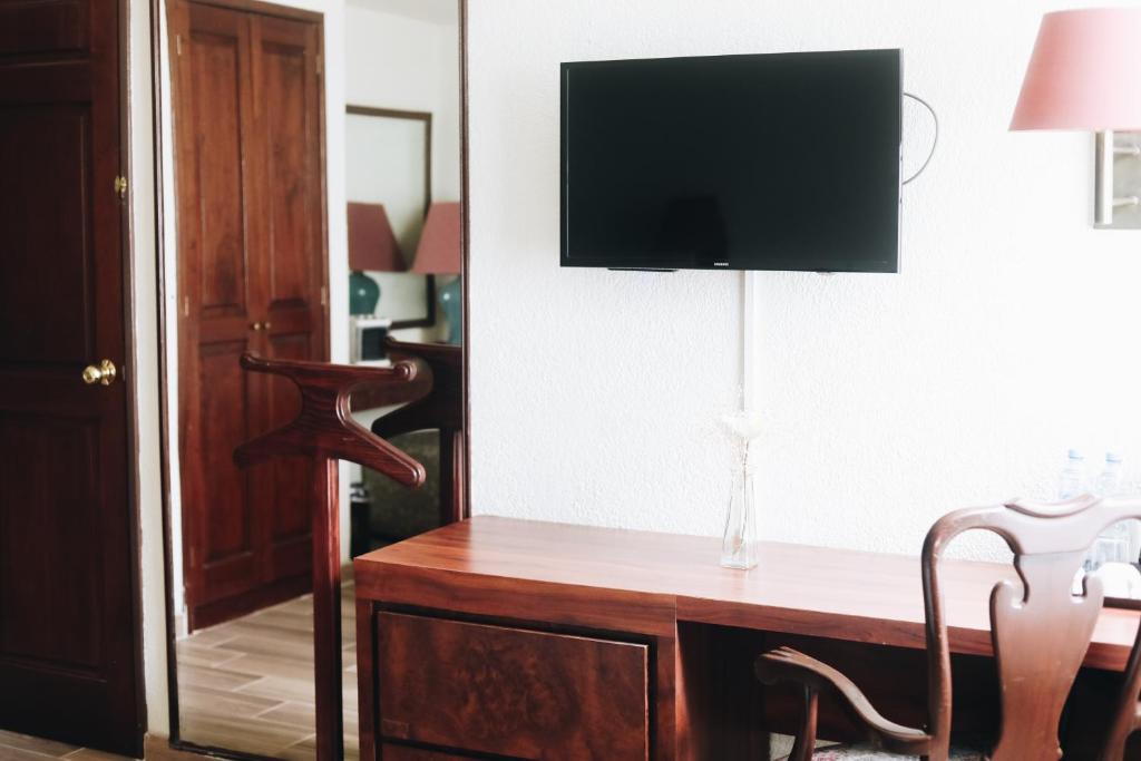 TV a/nebo společenská místnost v ubytování Hotel La Joya Tulancingo