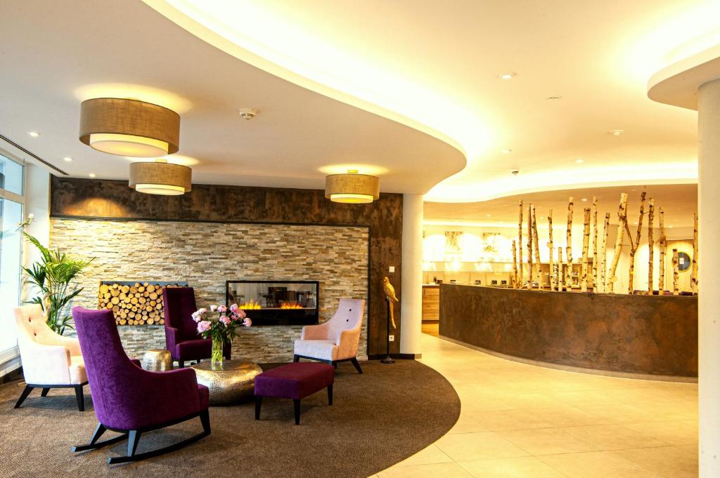 Posezení v ubytování Business Class Hotel Ebersberg