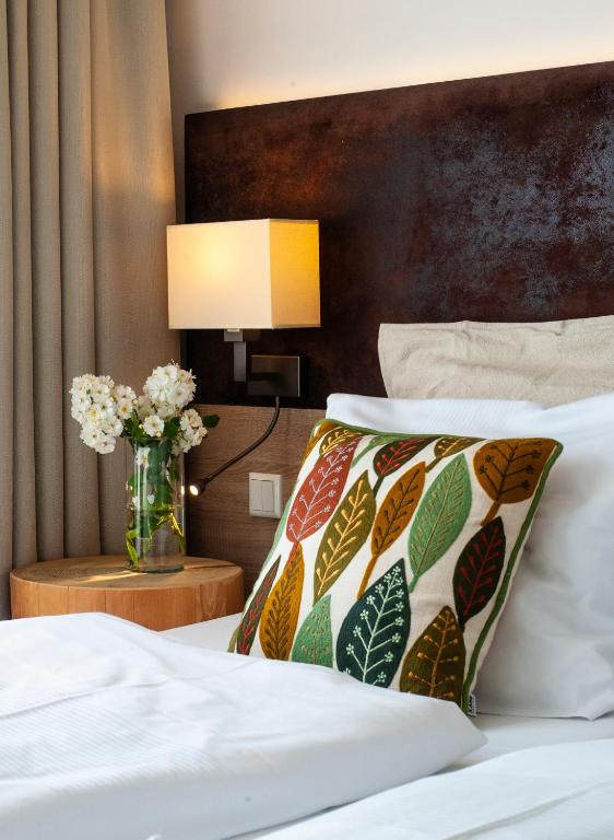 Postel nebo postele na pokoji v ubytování Business Class Hotel Ebersberg