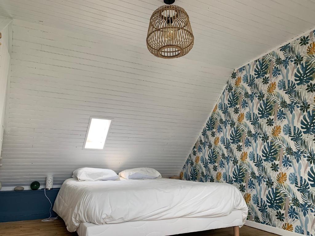 Katil atau katil-katil dalam bilik di Jolie maison au port de l’Ile Tudy