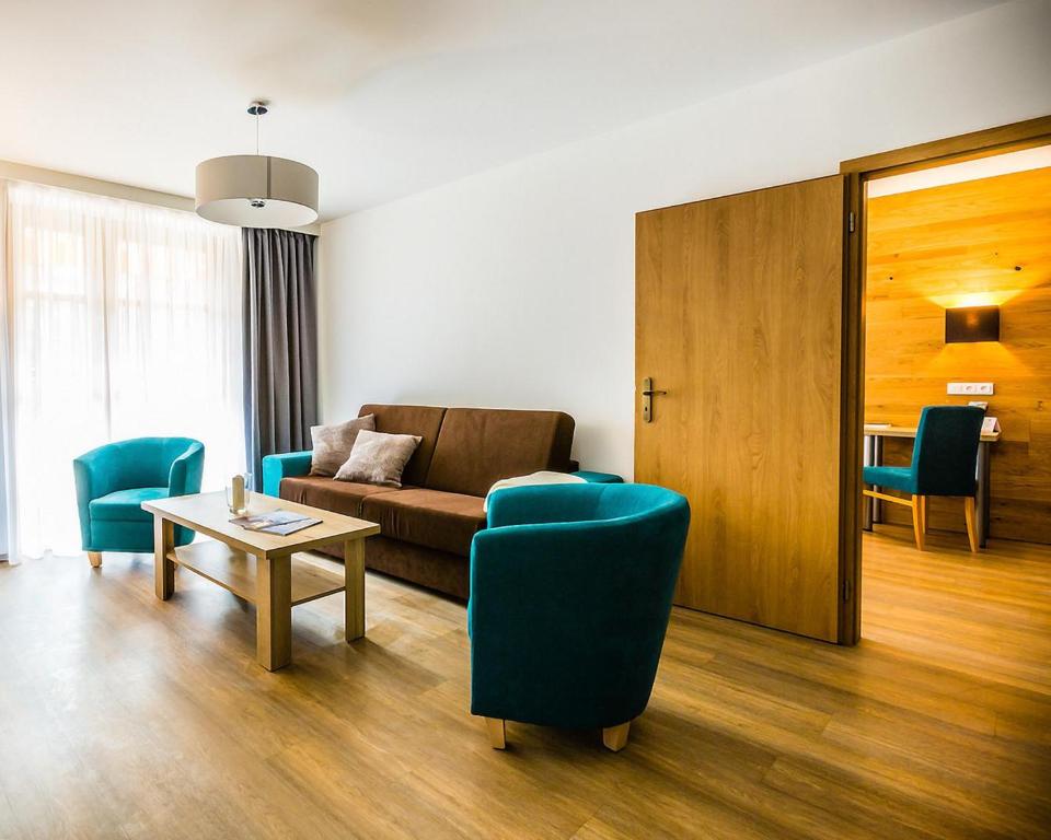 Posezení v ubytování Amenity Hotel & Resort Špindlerův Mlýn