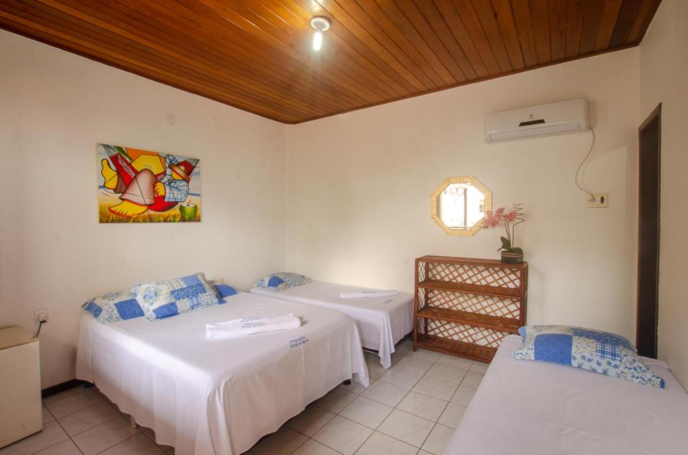 Cama o camas de una habitación en Pousada Portal do Morro