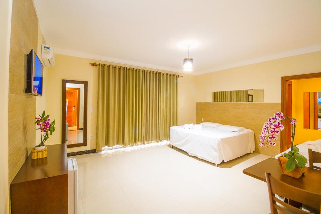 Postel nebo postele na pokoji v ubytování Vila Miola Hotel