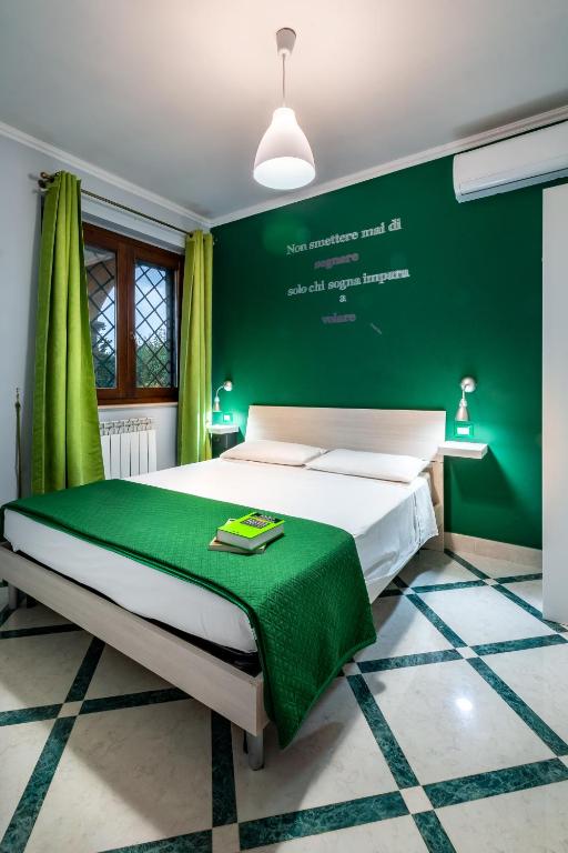 Postel nebo postele na pokoji v ubytování Il Bacio e La Nocciola