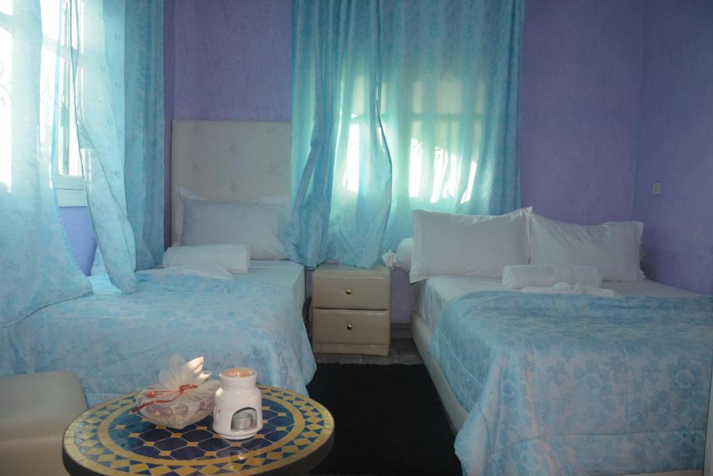 Postel nebo postele na pokoji v ubytování Auberge Ayam Atlas- pool 10mn away