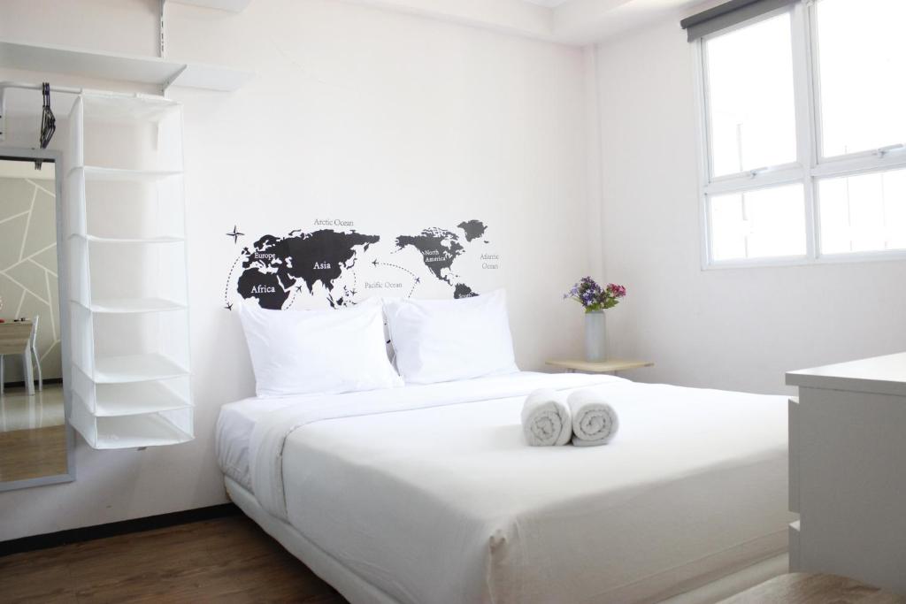 Postel nebo postele na pokoji v ubytování Spacious and Well Appointed 2BR @ Gateway Pasteur Apartment By Travelio