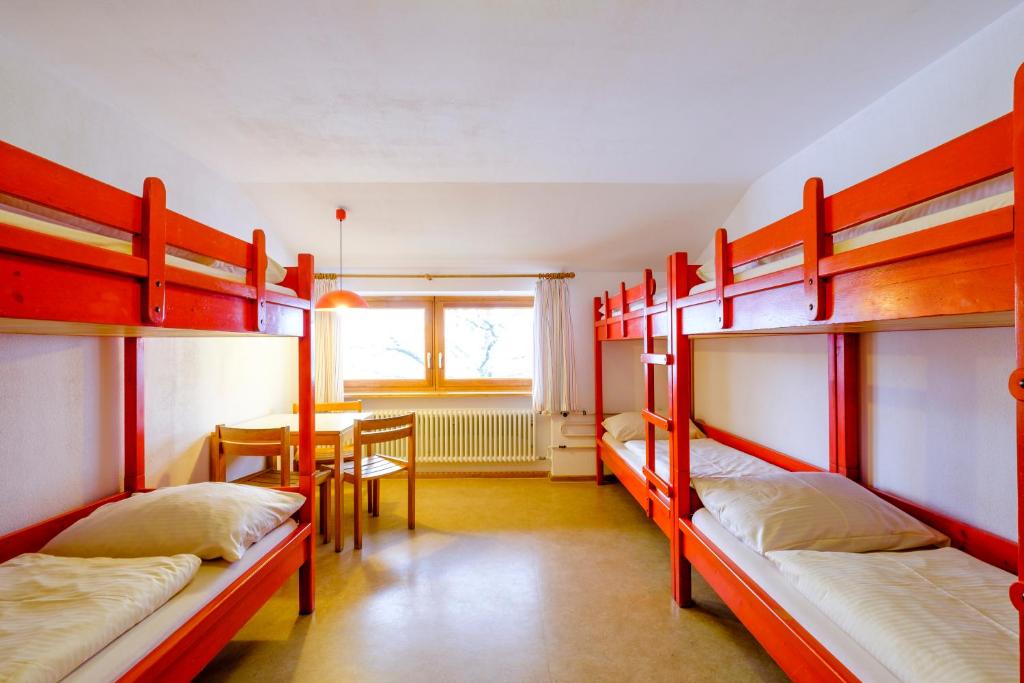 Postel nebo postele na pokoji v ubytování DJH Jugendherberge Pottenstein