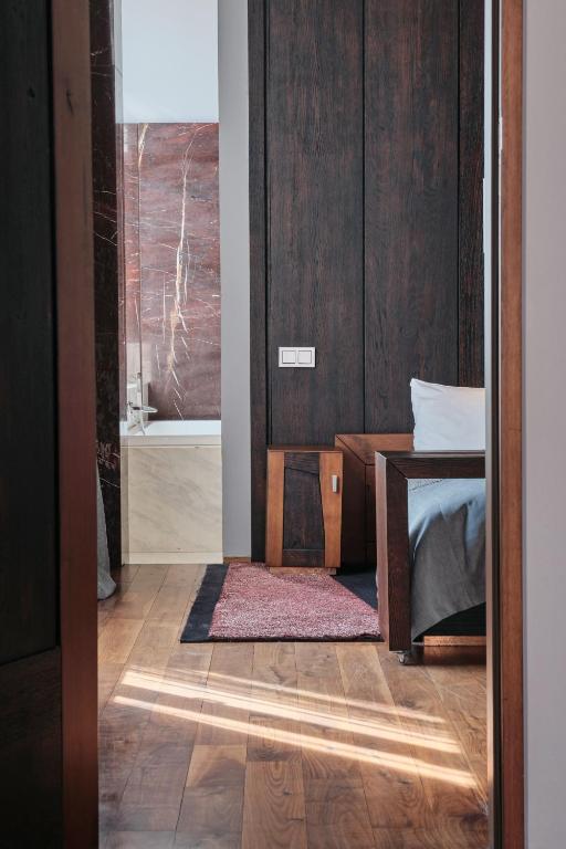Postel nebo postele na pokoji v ubytování Hotel Monopol